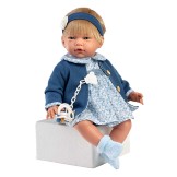 Muñeca Classic con pelo Olivia 42cm - Vestido azul con estampado de flores, chaqueta azul con botones, peuco, diadema y chupete